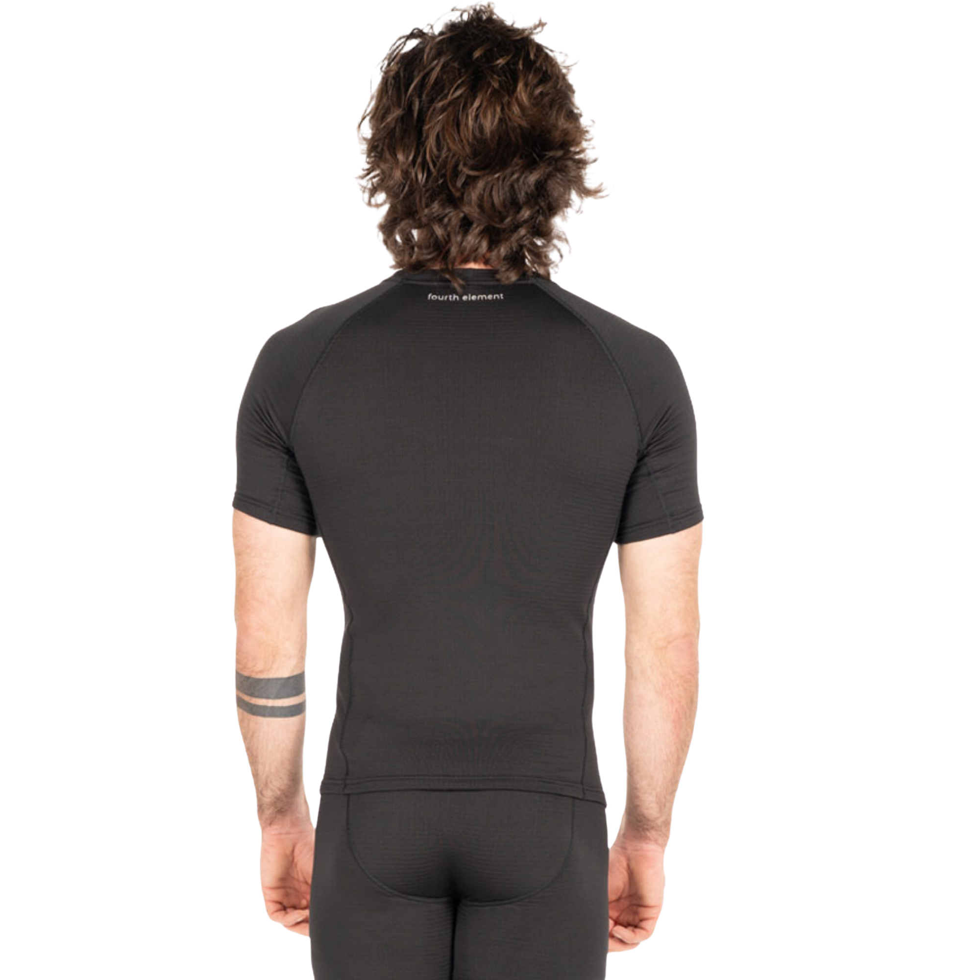 Rear view of a man with curly brown hair wearing a tight-fitting black short-sleeve athletic jersey and matching black shorts against a plain white background.