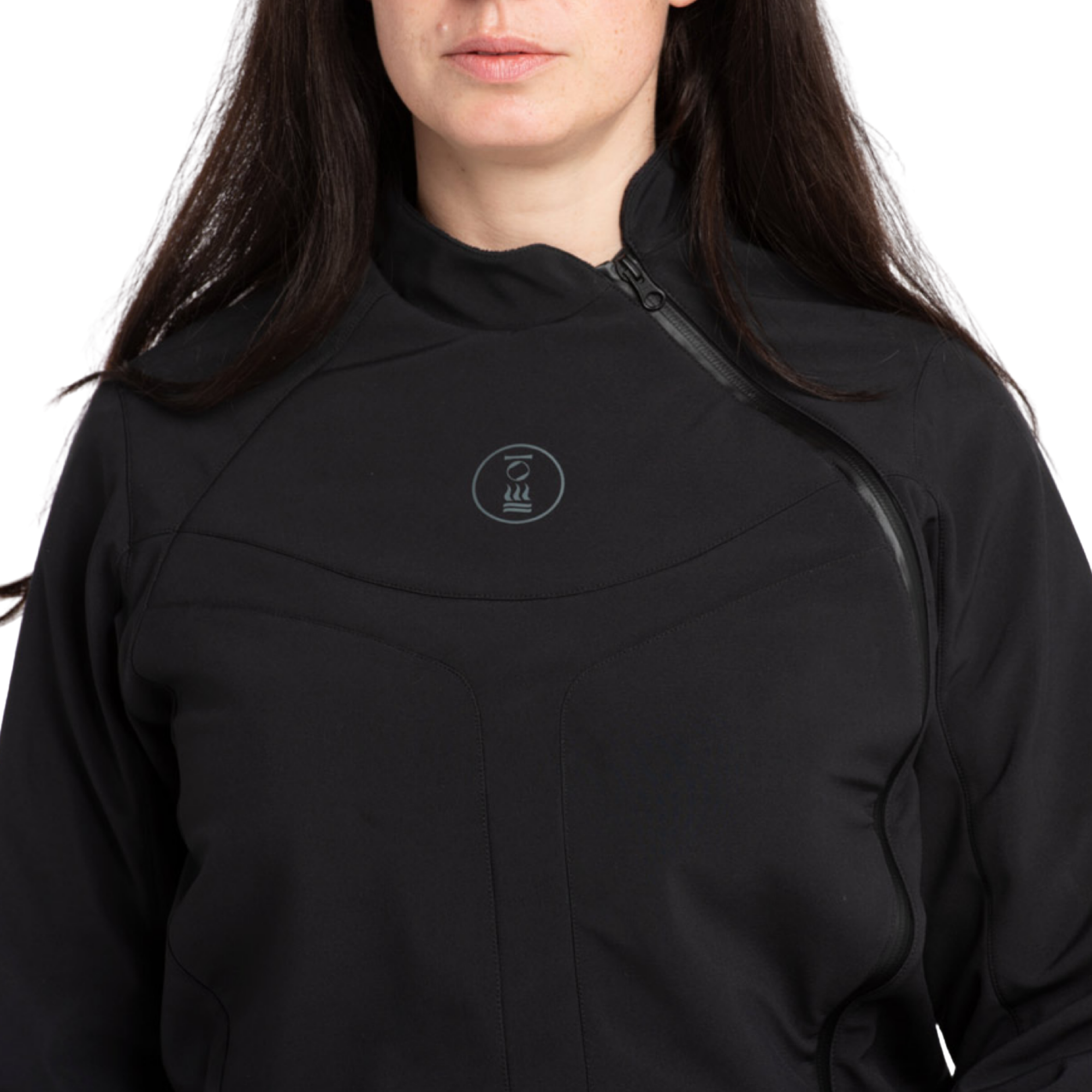 A close-up of a woman wearing a black athletic jacket with a high collar, zippered front, and a small circular logo on the left chest, set against a plain white background.