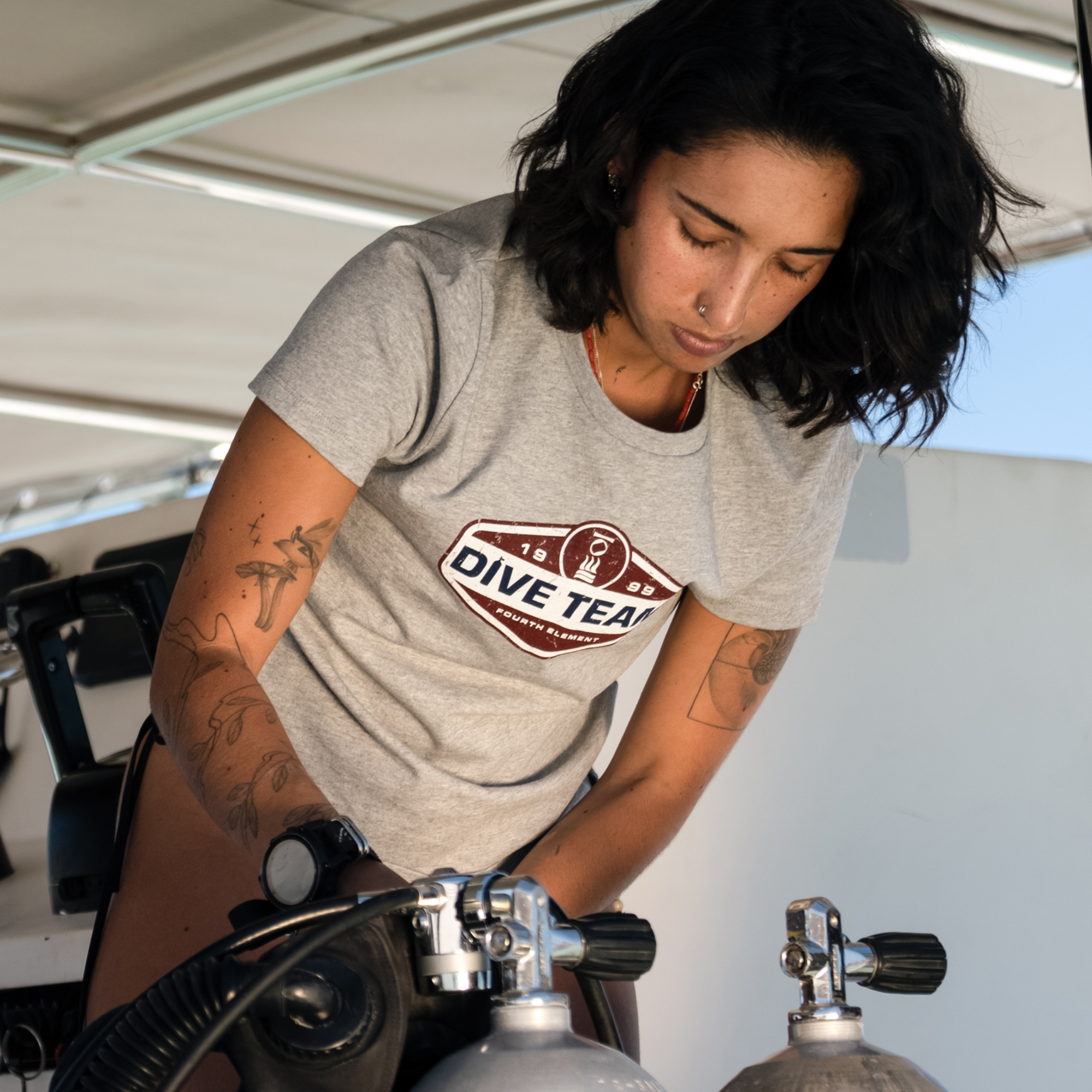 Fourth Element Women’s Dive Team 26 T-Shirt with scuba diving-inspired graphic for divers and ocean lovers