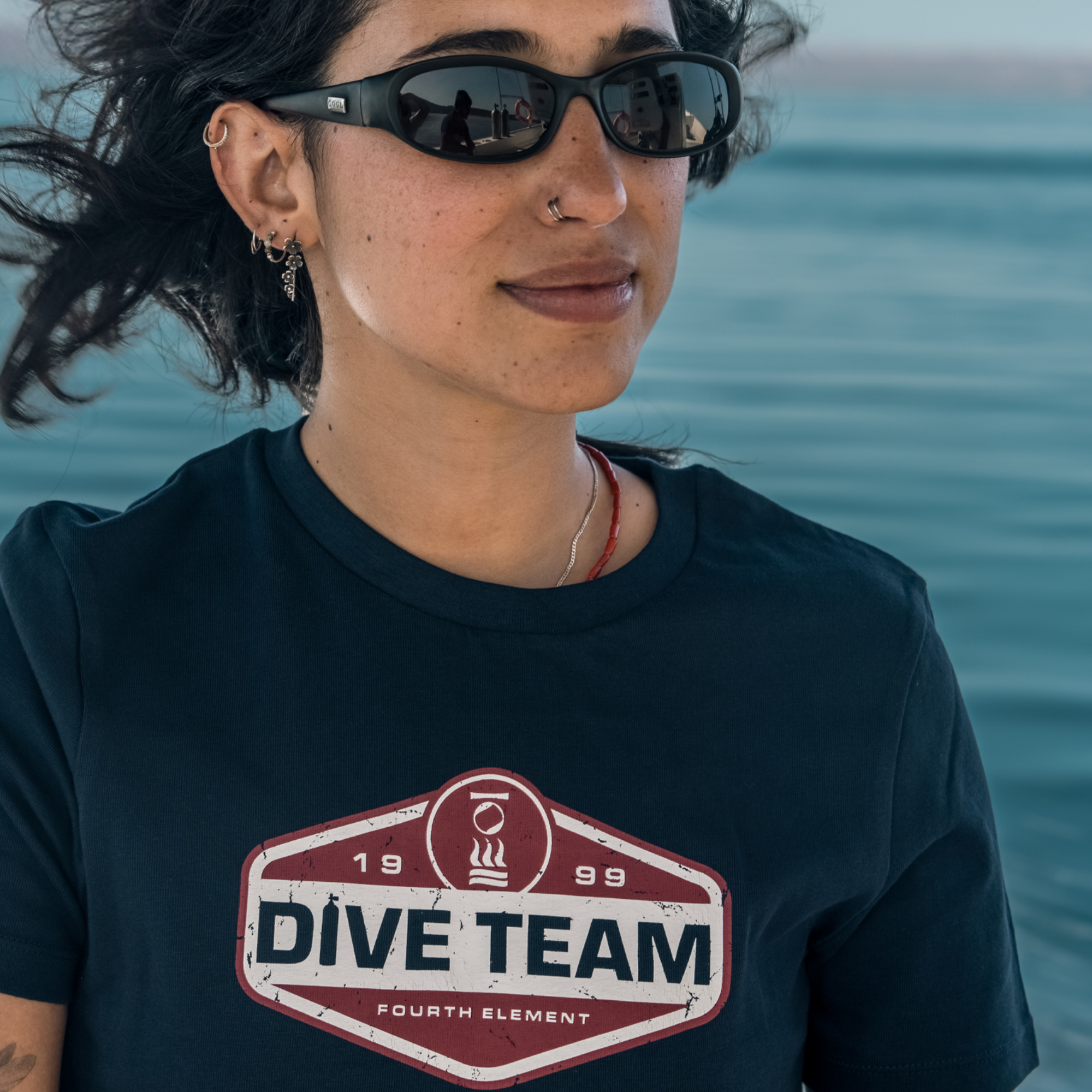 Fourth Element Women’s Dive Team 26 T-Shirt with scuba diving-inspired graphic for divers and ocean lovers