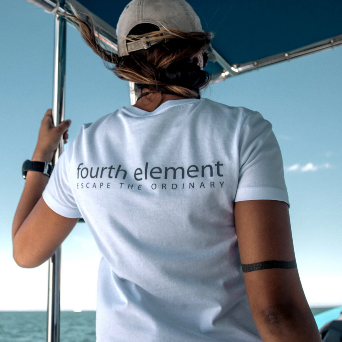 Fourth Element Women’s Escape the Ordinary T-Shirt in organic cotton for scuba divers and ocean lovers
