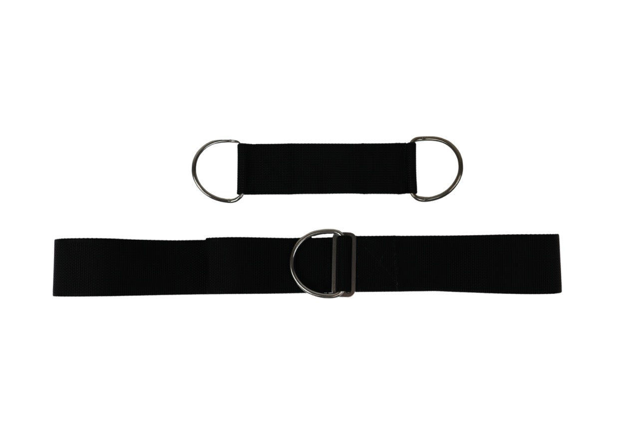 Two pieces of black webbing, one shorter one with two stainless steel d-rings on each end and another bigger piece, the Halcyon Butterfly and a crotch strap, on white background
