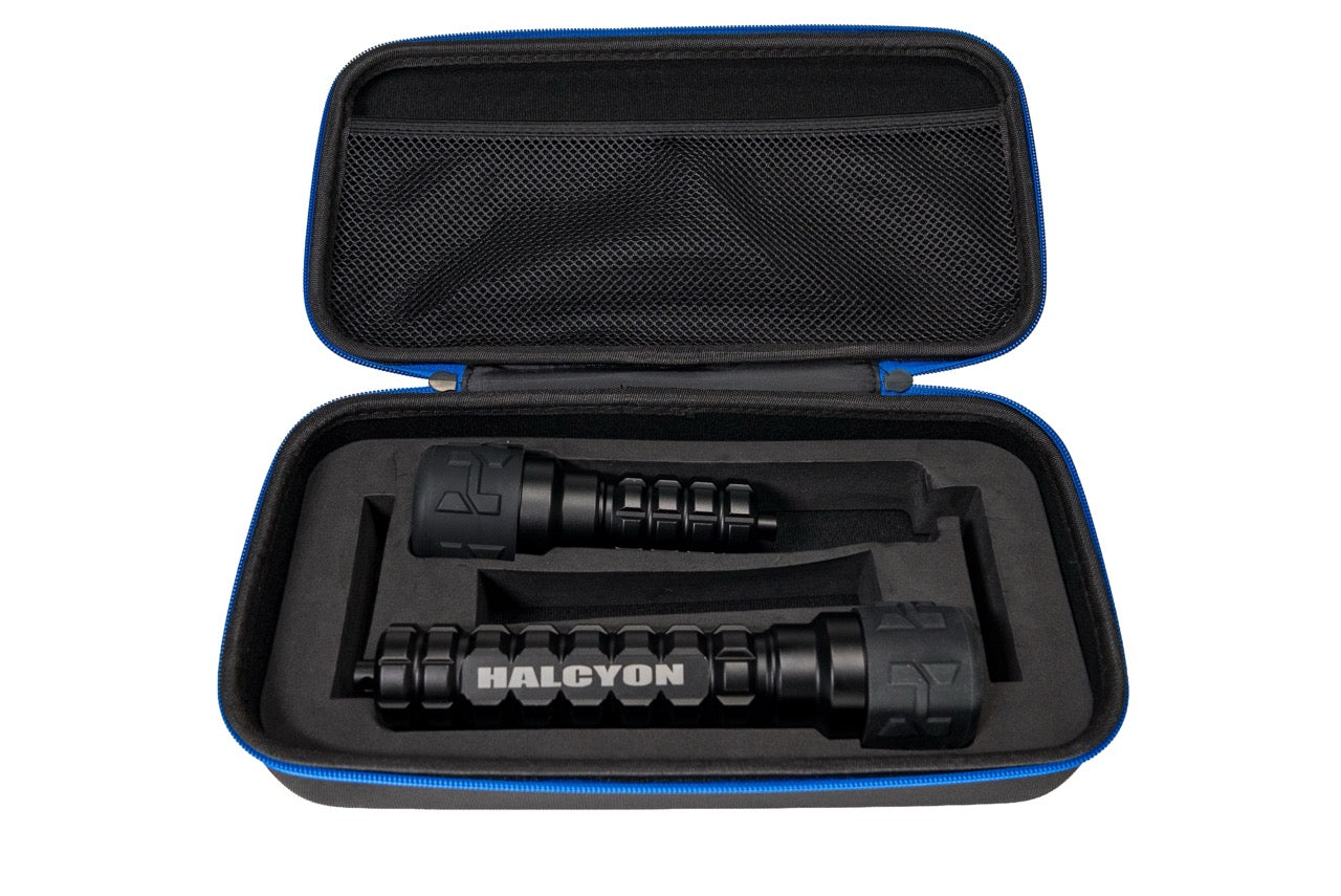 Two black Halcyon Photon Lights in a black and blue case on white background