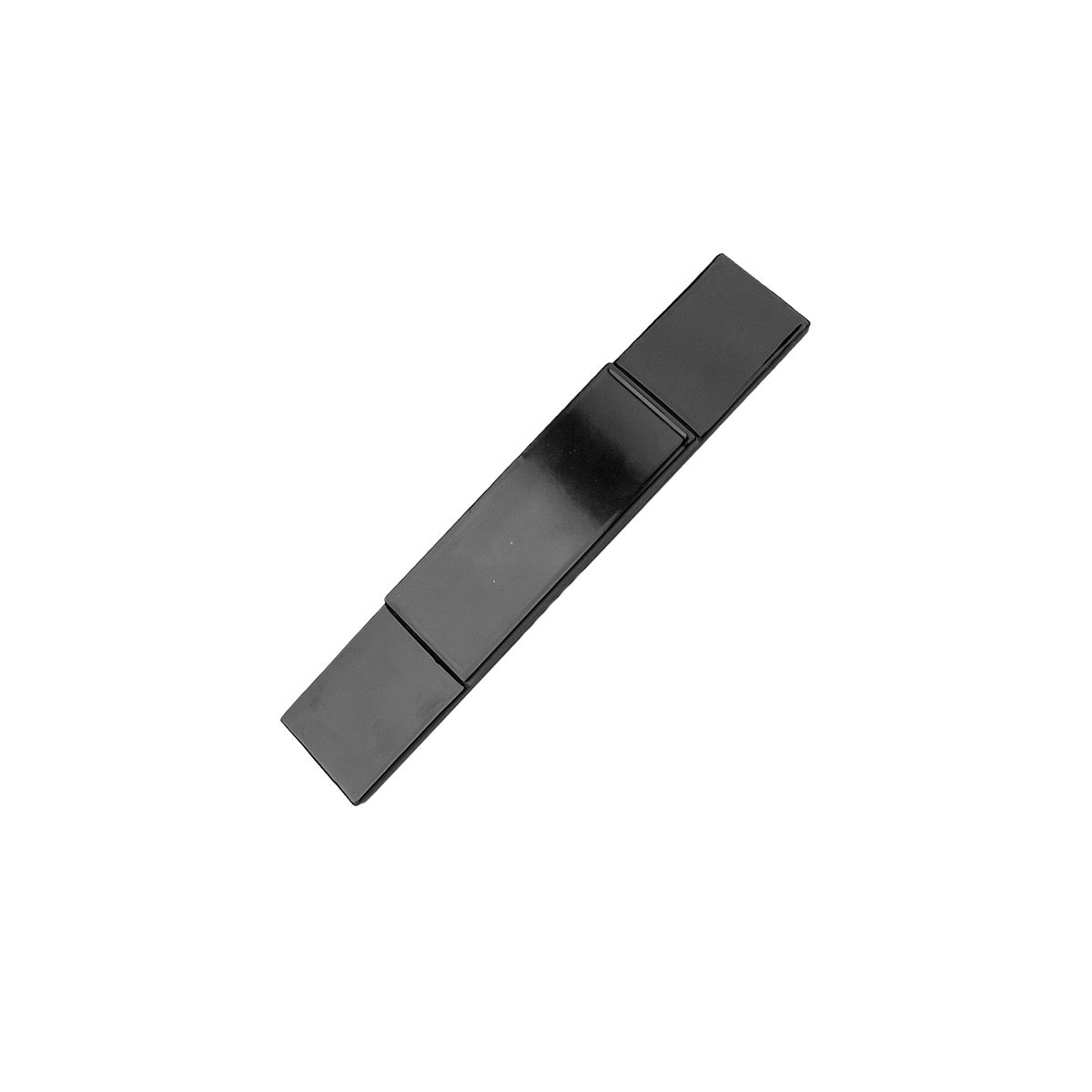 Close-up of black plastic Halcyon weight for scuba diving on white background