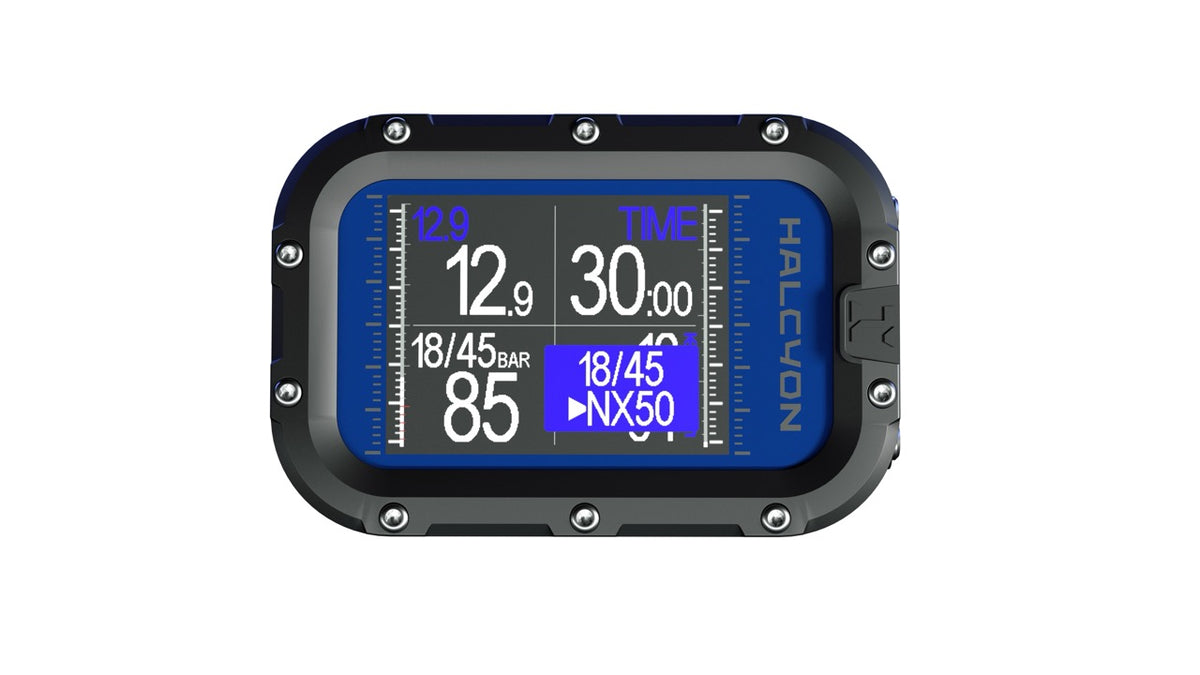 A black and dark blue Halcyon dive computer with a colorful screen displaying depth, time, temperature, and pressure metrics, shown against a plain white background.