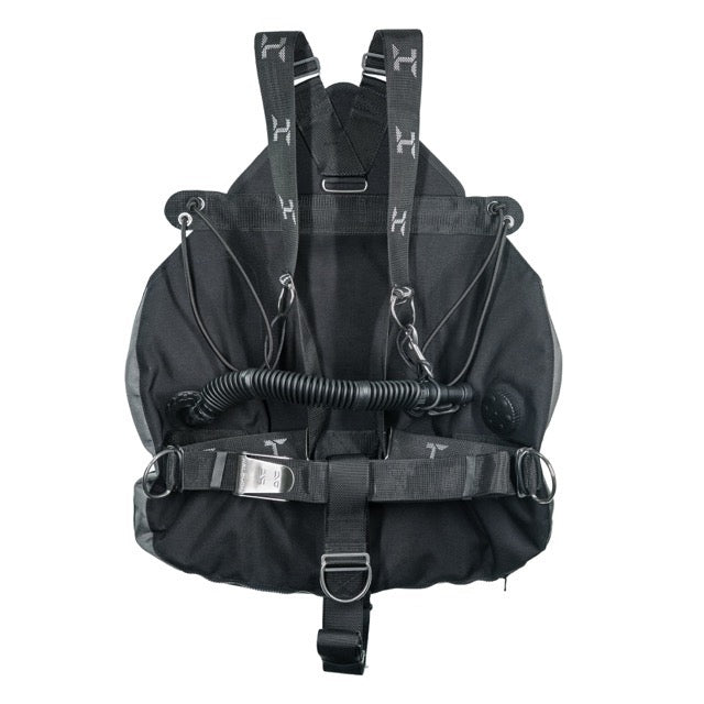 A Black Halcyon Zero gravity Sidemount System on white background for scuba diving