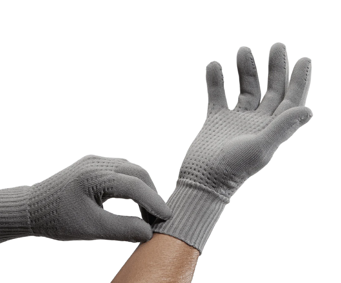 2 hands with grey KO1 under gloves on white background