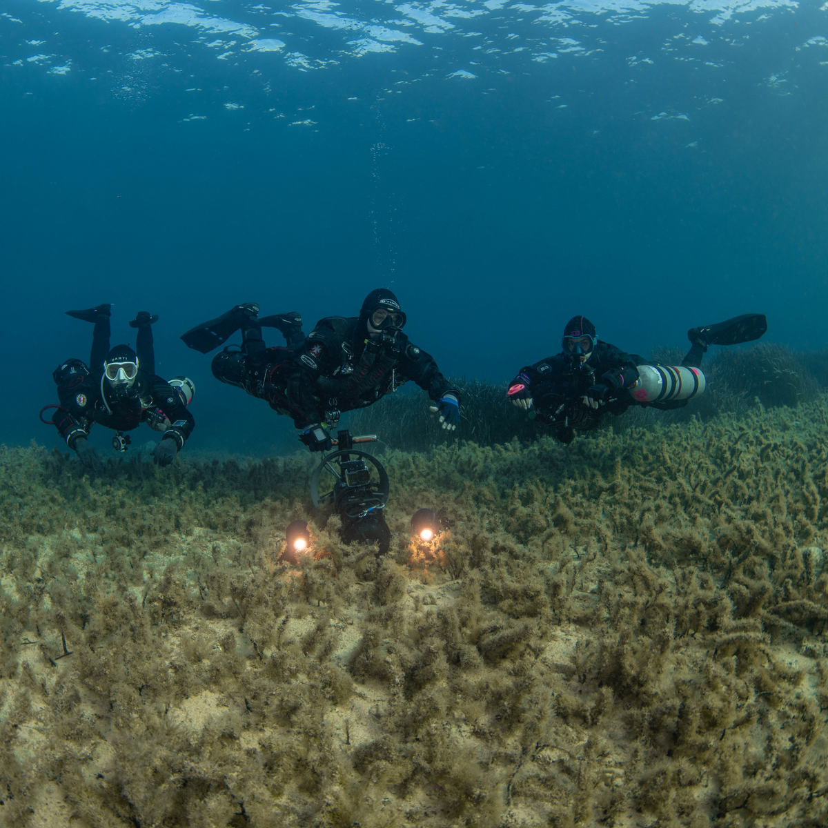 Three CCR Divesoft Liberty Sidemount Divers and a Seacraft DPV