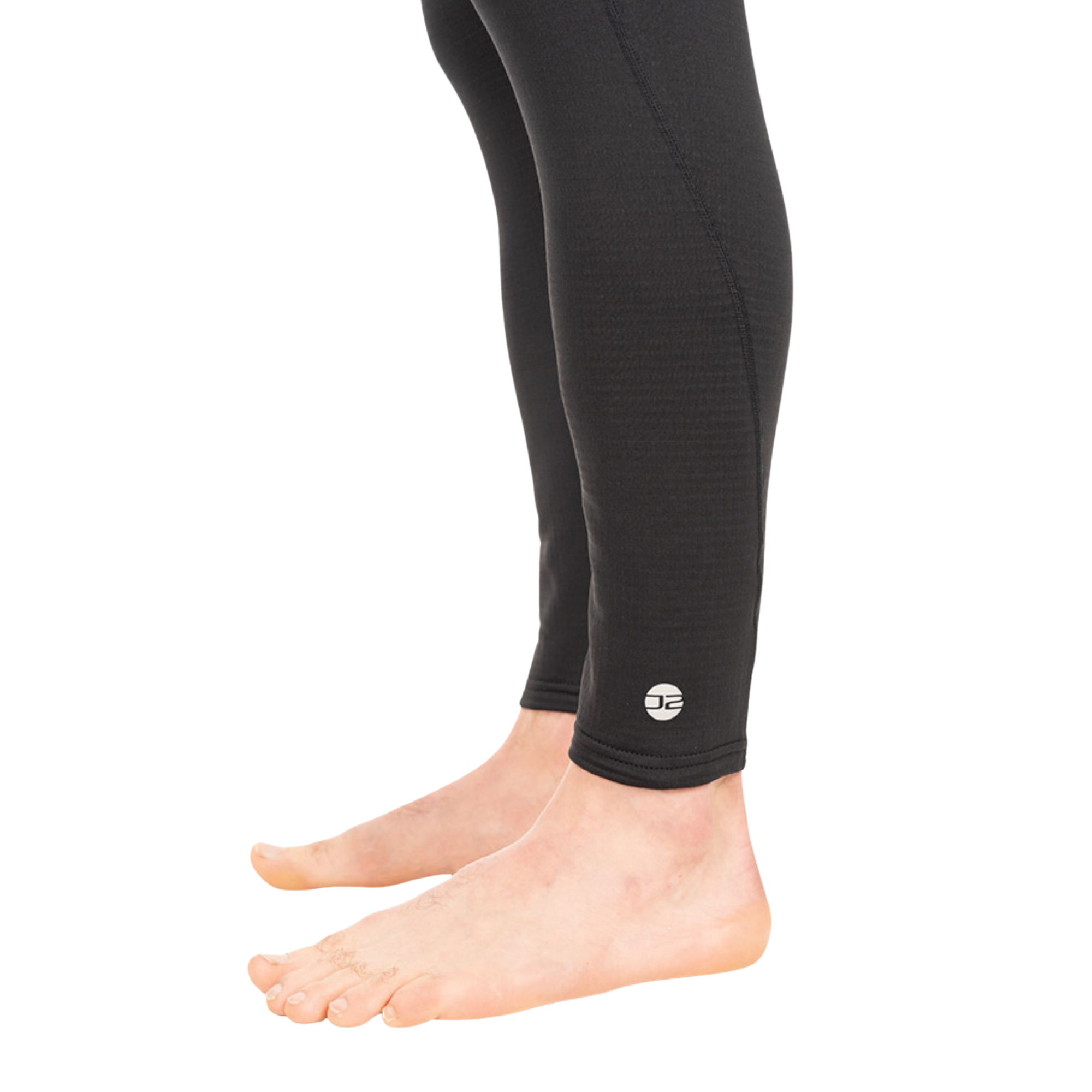 Black textured compression leggings worn on a person's legs, shown from the side against a plain white background.