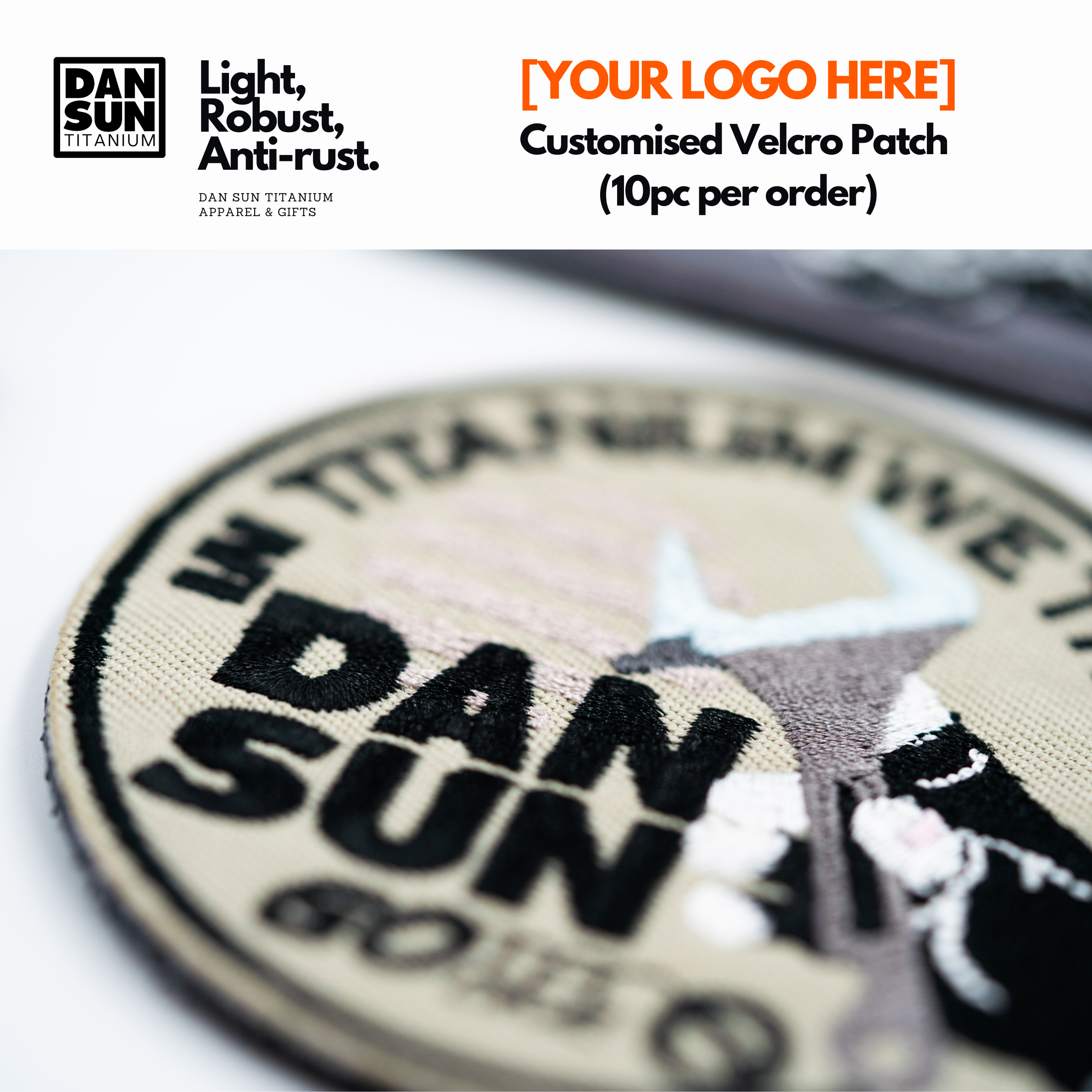 Embroidered In Titanium We Trust logo patch, close-up
