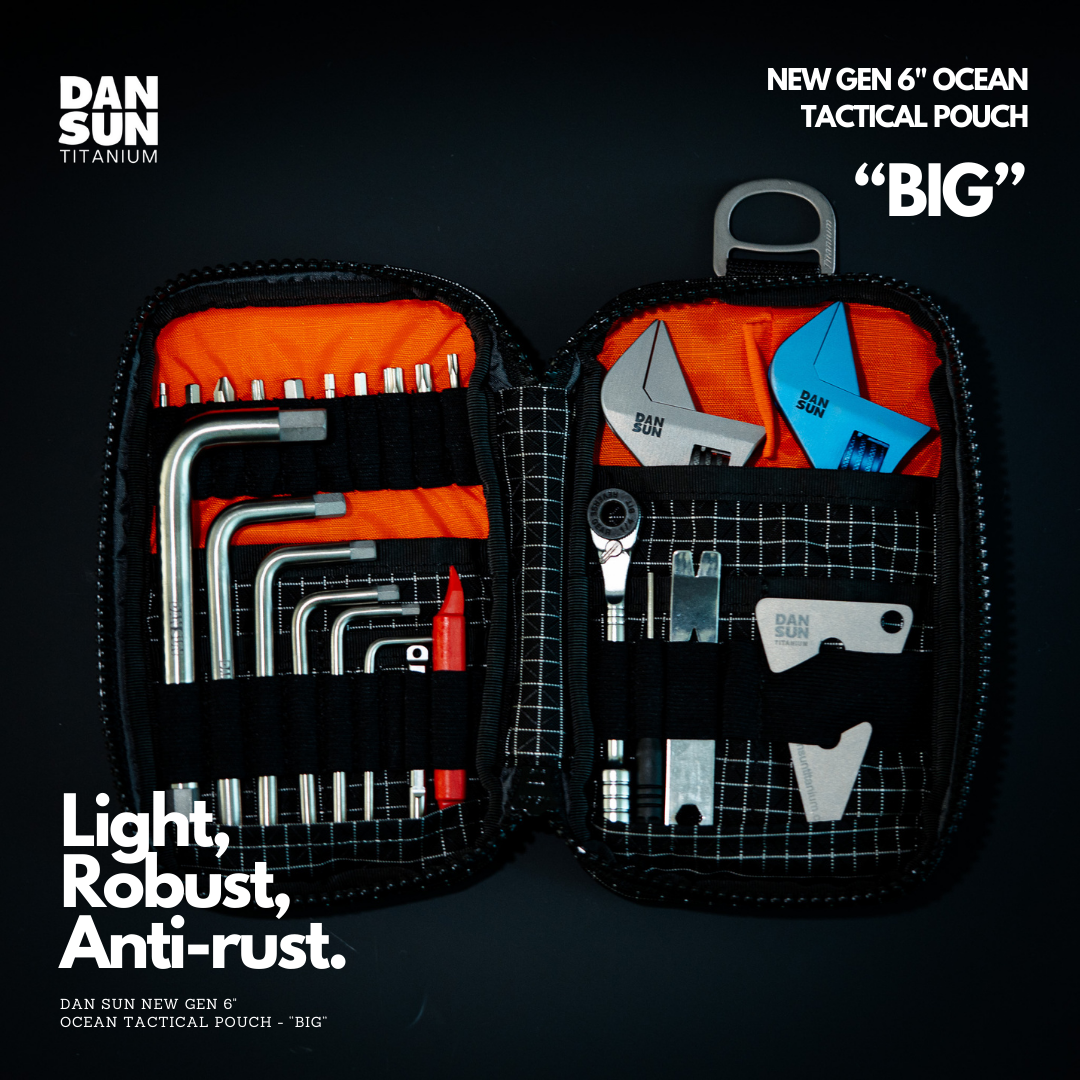 Ocean Tactical BIG pouch open with titanium tools and orange lining
