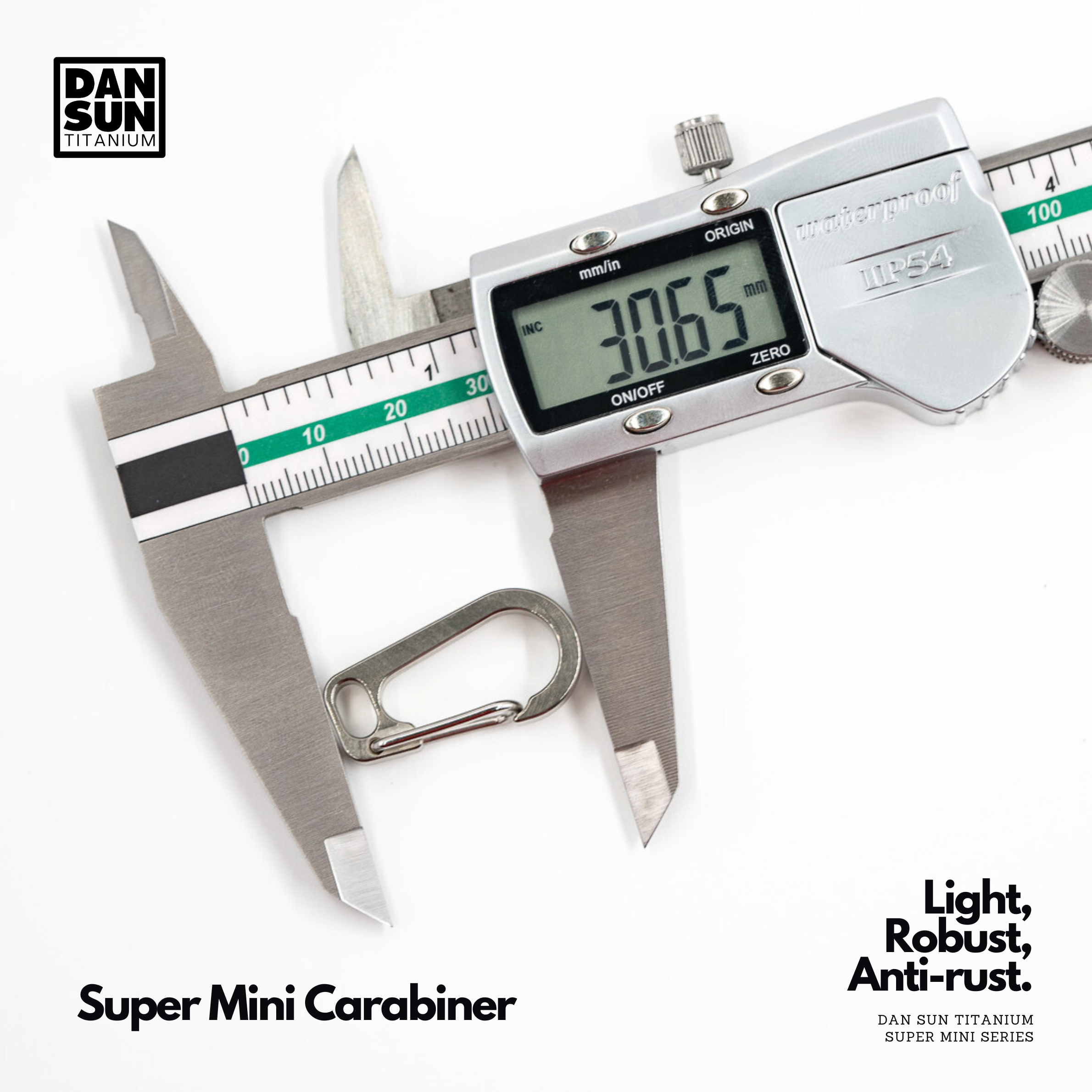 Super mini titanium carabiner measured at 30.65 mm