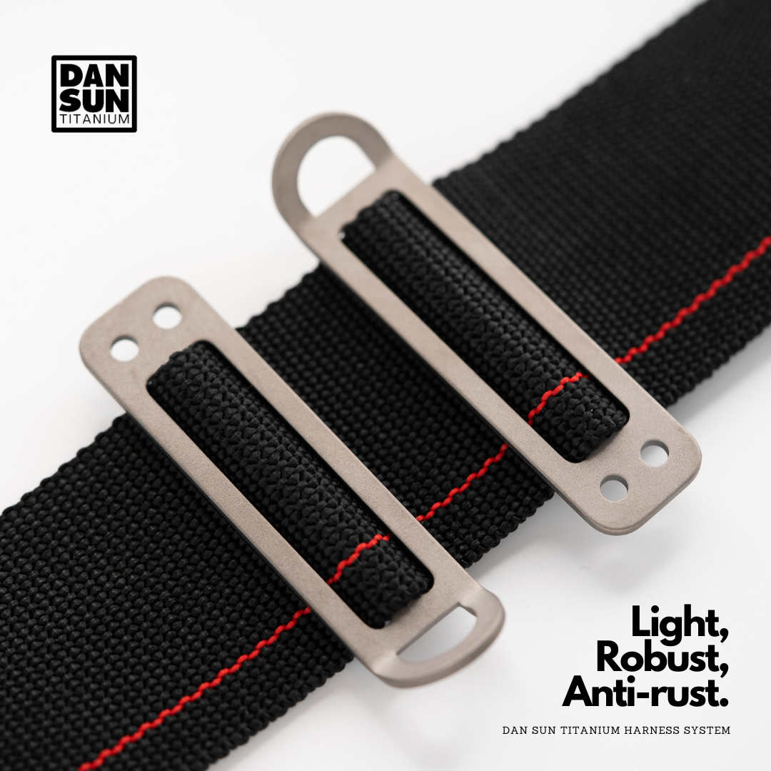 Titanium bungee tri-glides on harness webbing