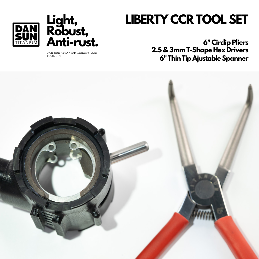 Titanium circlip pliers next to a Liberty CCR head