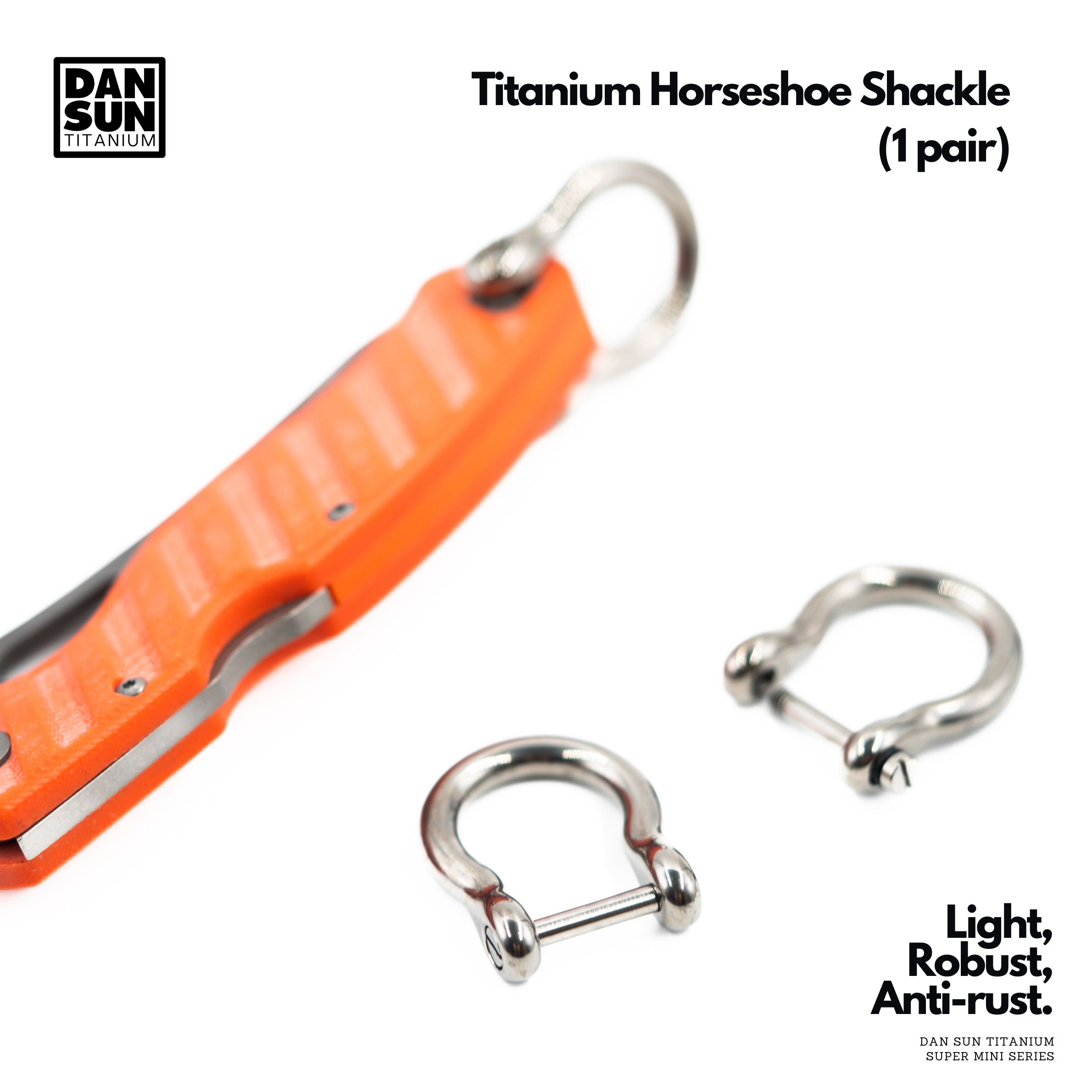 Titanium horseshoe shackles next to an orange rope cutter