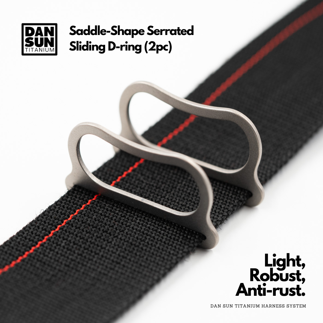 Titanium saddle D-rings on harness webbing, side view