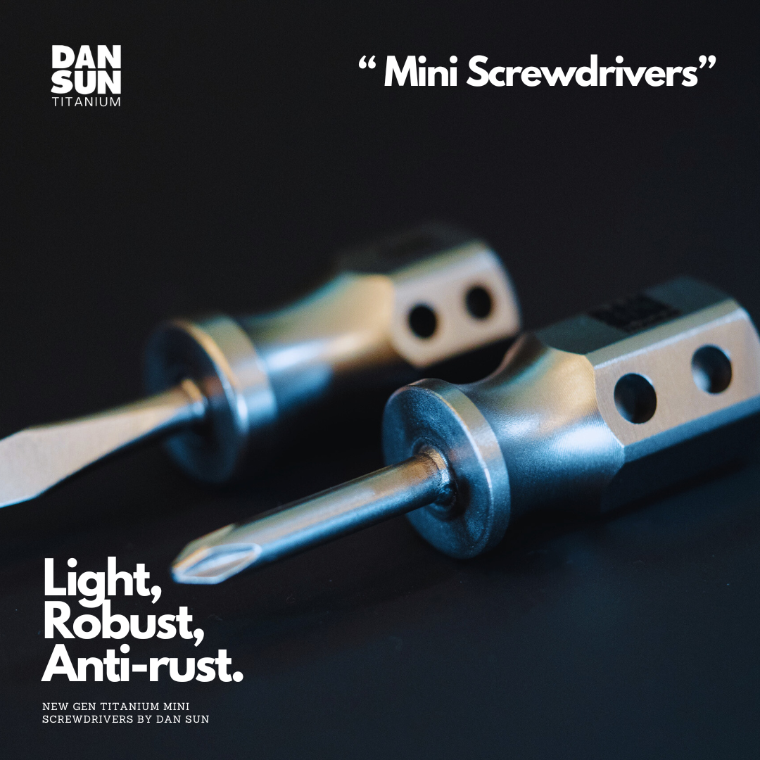 Titanium mini screwdrivers on a dark background