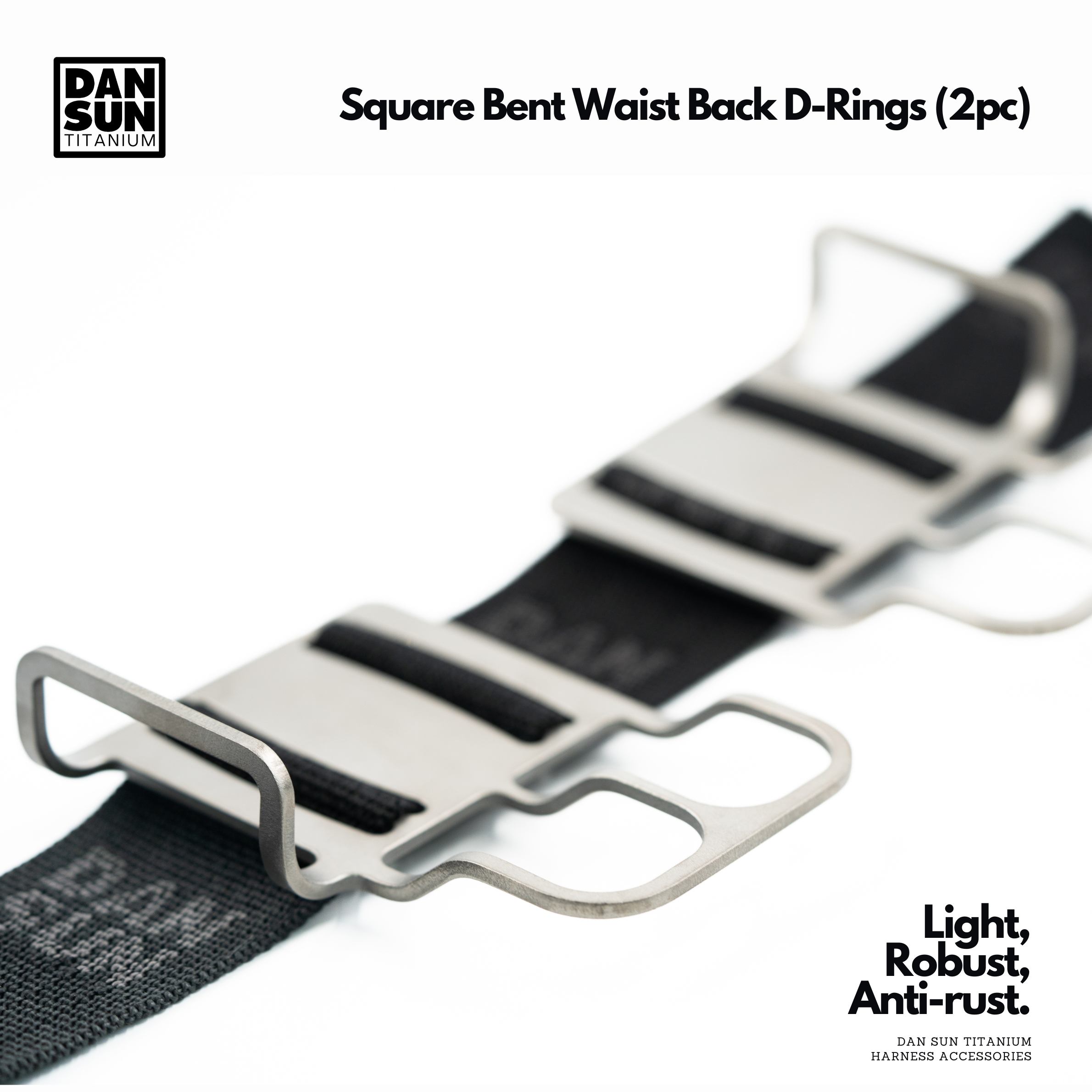 Square bent titanium waist D-ring on black harness webbing