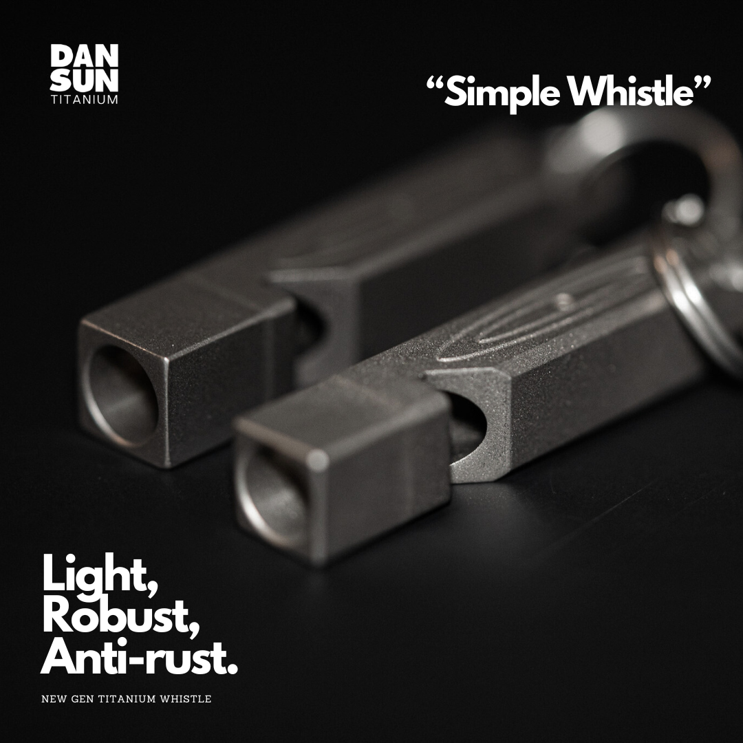 Two DanSun titanium whistles, close-up of the openings