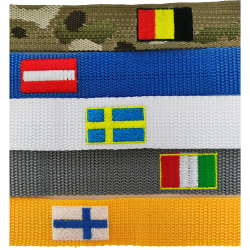 Embroidered flags on tank strap tabs