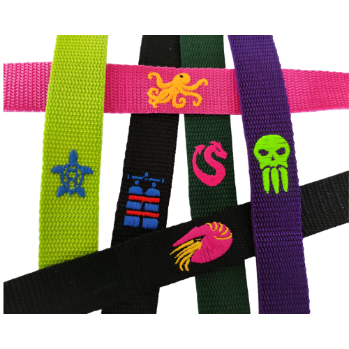 Embroidered icons on coloured tabs