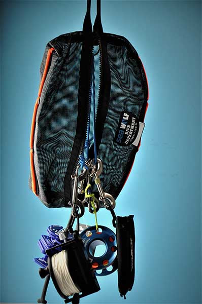 Mesh bag hanging with spools and clips