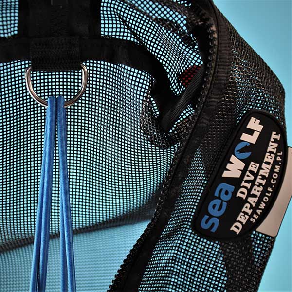 Mesh bag with sewn-in D-ring and bungee, close-up
