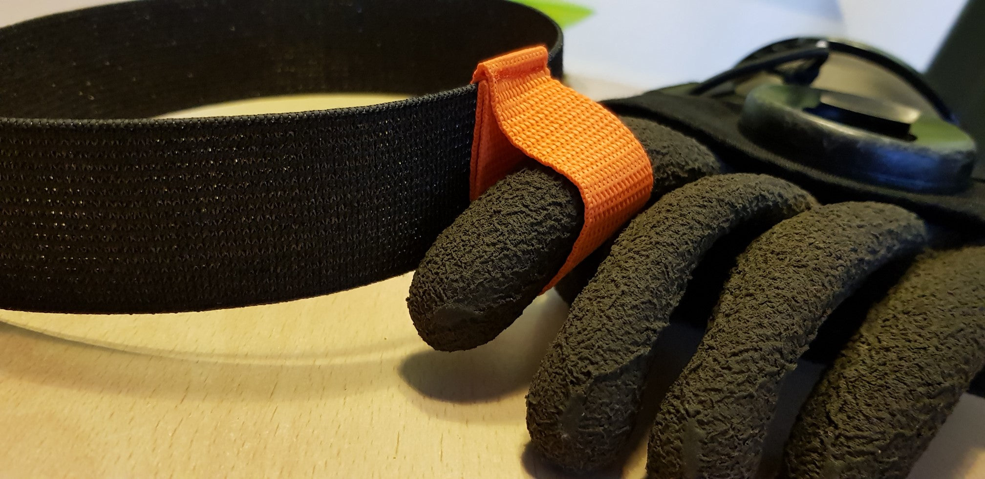 Pulling the EVO tab with a thick neoprene glove