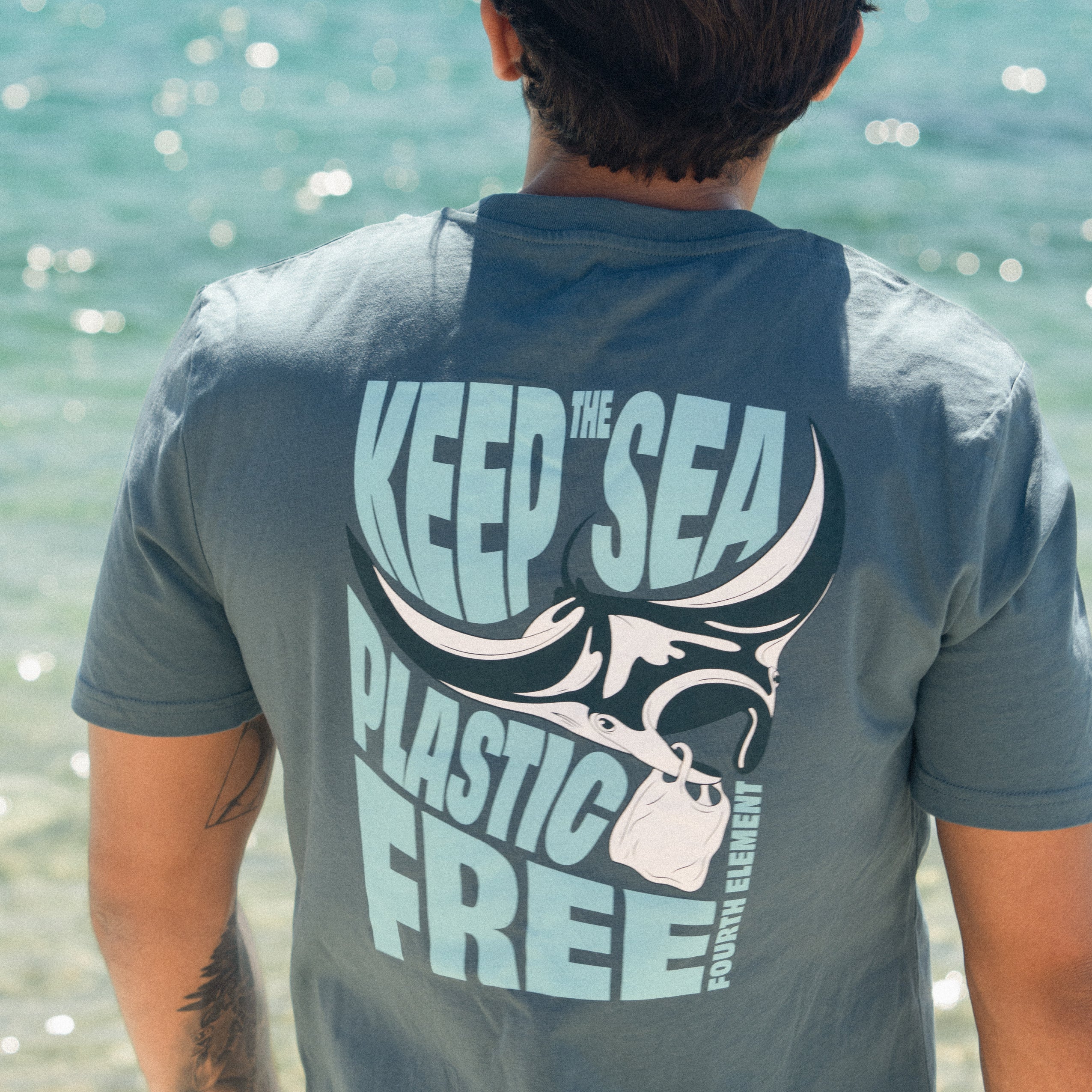 Fourth Element Men's Plastic Free T-Shirt, Stargazer, worn by a diver