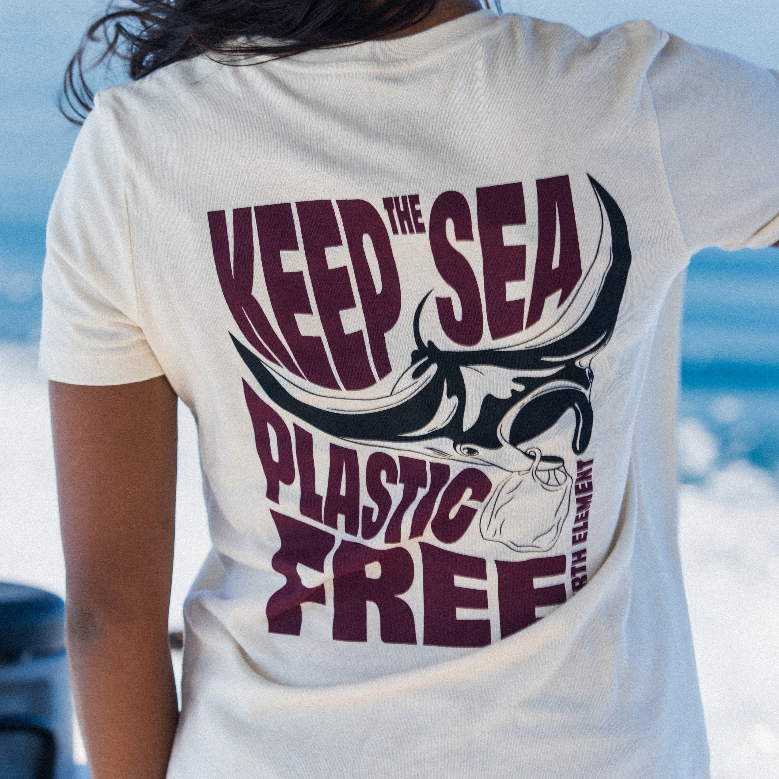 Fourth Element Women's Plastic Free T-Shirt, worn by a diver