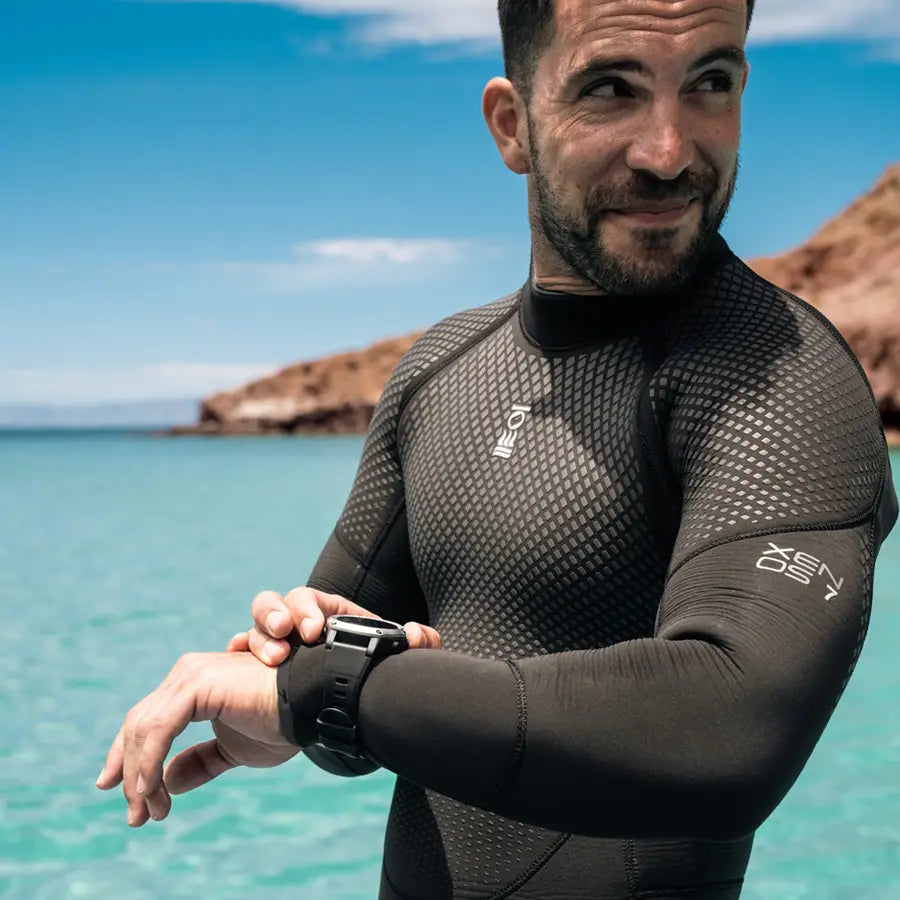 Fourth Element Men's Xenos ARC 7mm Wetsuit, worn by a diver