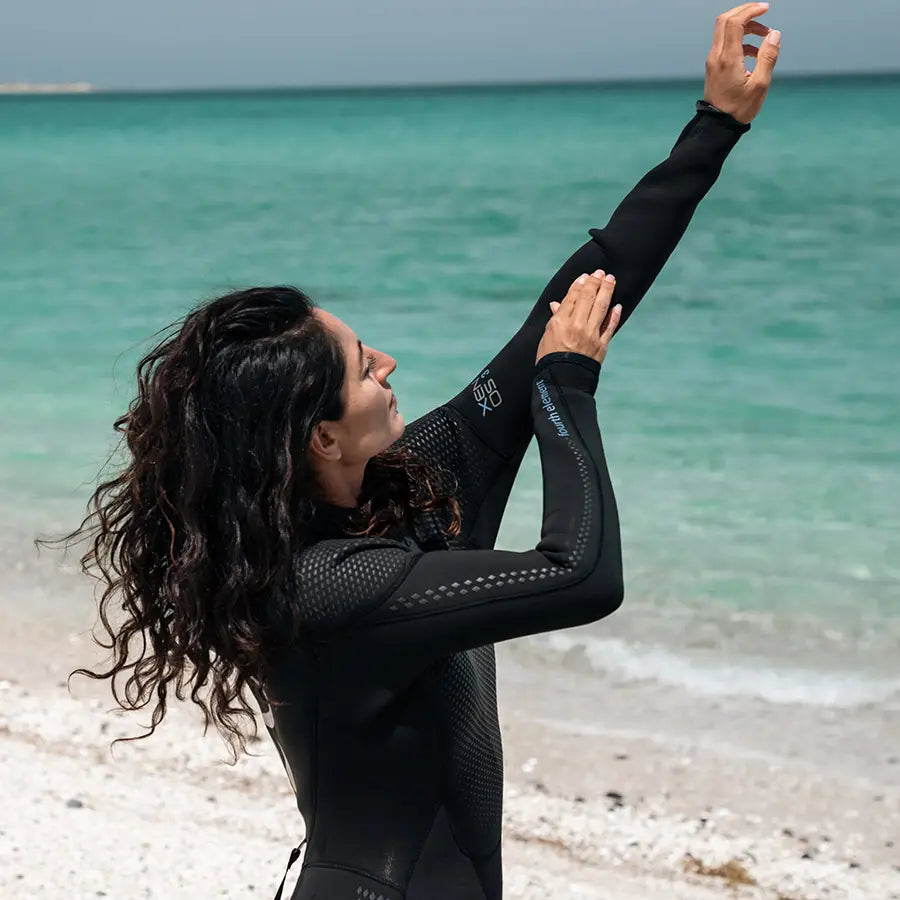 Fourth Element Women's Xenos ARC 3mm Wetsuit, worn by a diver