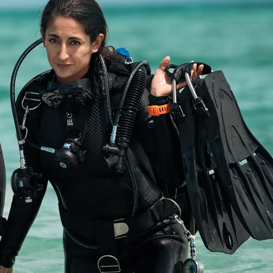 Fourth Element Women's Xenos ARC 7mm Wetsuit, worn by a diver
